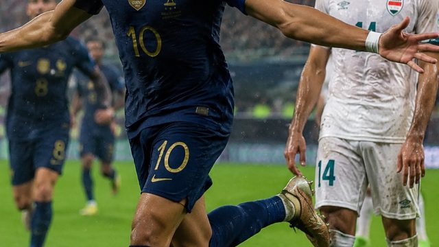 France Triumphs Over Iraq in Action-Packed Weather-Delayed World Cup Match